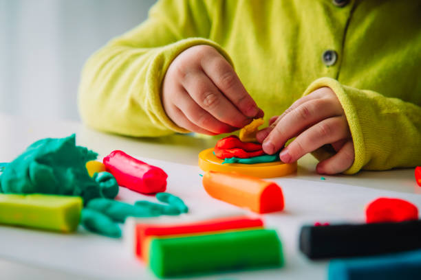 istock Child playing with clay molding shapes, kids crafts 1137552241
