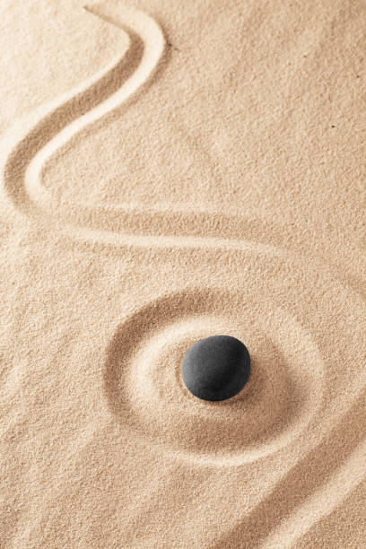 istock Raked sand and spa wellness healing stone 1137557818