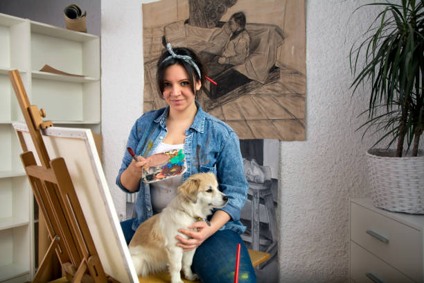 istock Black hair woman with her dog 1137558975