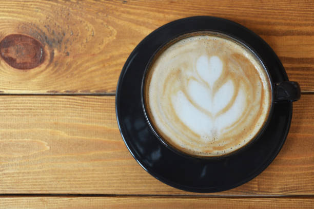 istock Cup of coffee, cappuccino on wood table with copy space 1137559011