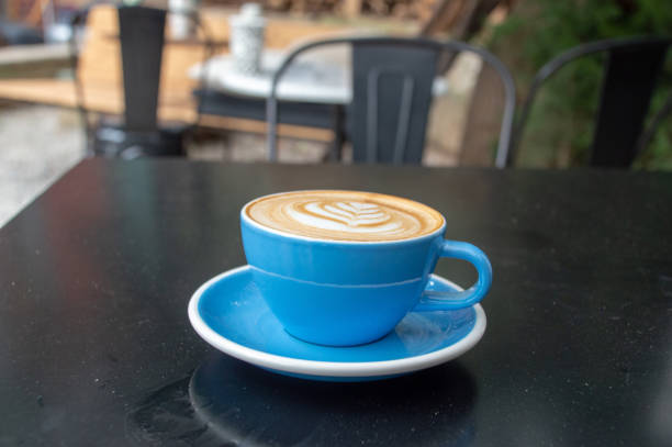 istock Cup of coffee, cappuccino on outdoor cafe table 1137559387