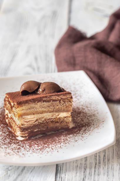 istock Portion of tiramisu on the white plate 1137559698