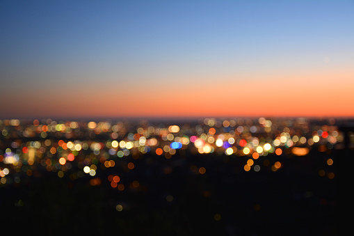 Bokeh lights of a city at sunset. Los Angeles by night.