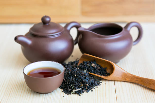 istock Dishes for tea and black tea sprinkled on the table. 1137564588