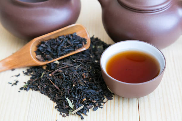 istock Dishes for tea and black tea sprinkled on the table. 1137565163