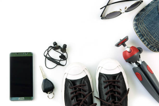 istock sneaker and mobile phone and travel accessories isolated on white background 1137565879