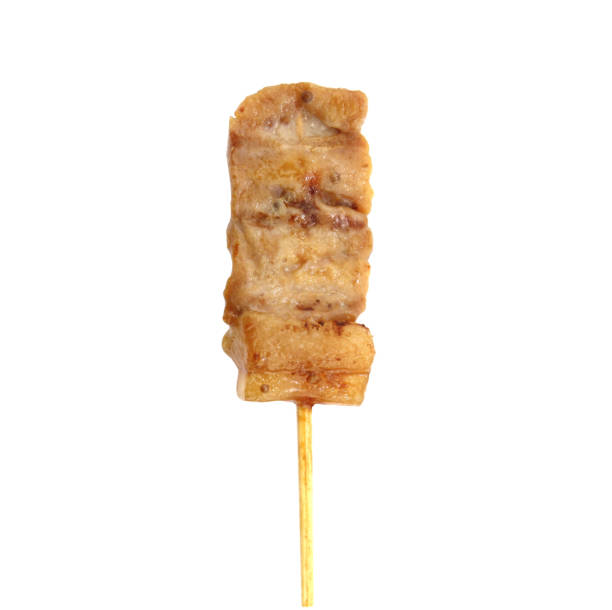 istock Grilled pork with bamboo stick on white background 1137569515