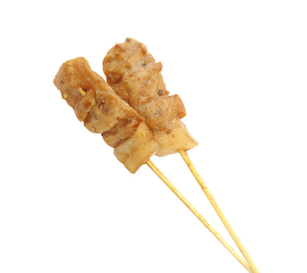 istock Grilled pork with bamboo stick on white background 1137569930