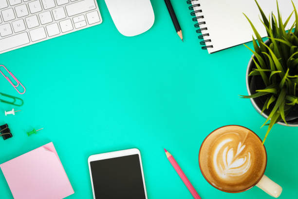 istock office desk with smartphone, computer and office supplies top view 1137571478