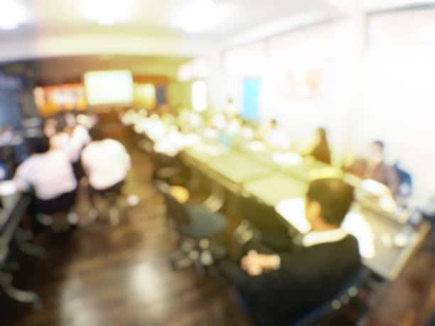 istock Blurred image of group of students are learning and lecture and using computer together in classroom for study and workshop in computers room at school. education technology or training concept. 1137573294