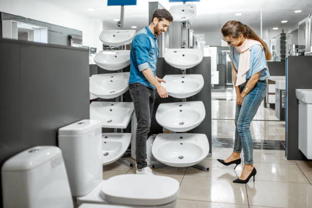 istock Couple chooosing new ceramic sink in the shop 1137575989
