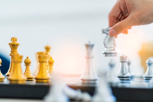 istock strategy business ideas concept with chess board game with hand choice turn solution 1137576576
