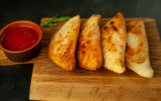 istock Latin American fried empanadas with tomato sauce.  Top view. 1137582823