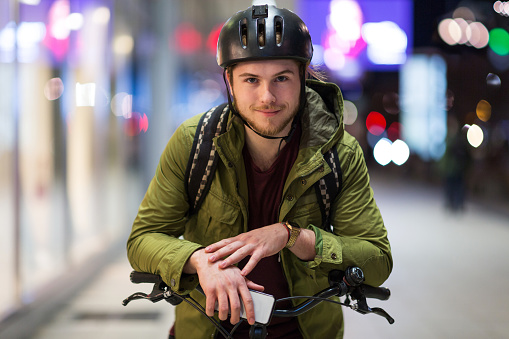 Young man on bicycle in the city