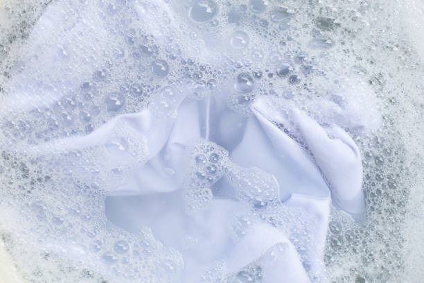 istock Soak a cloth before washing, white cloth 1137585616
