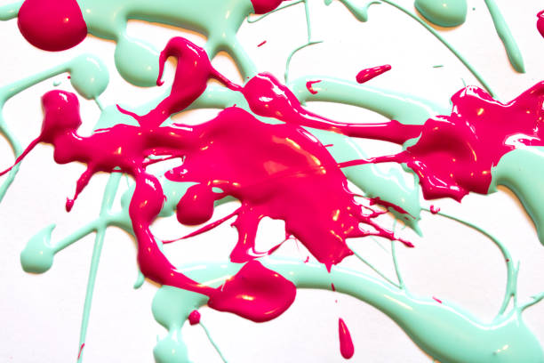 istock Pink and Blue Messy Paint Splatters Background 1137585661