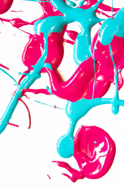 istock Pink and Blue Messy Paint Splatters On White Background 1137588045