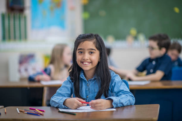 istock Girl With Pencil Crayons 1137594501