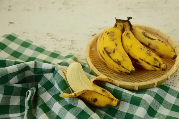 Fresh organic Latundan bananas (Tundan, Silk bananas, Pisang raja sereh, Manzana or Apple bananas)