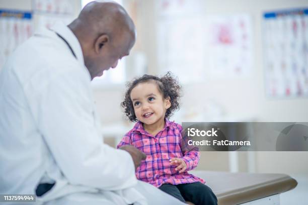 Girl At The Doctors Stock Photo - Download Image Now - Child, Doctor, Patient