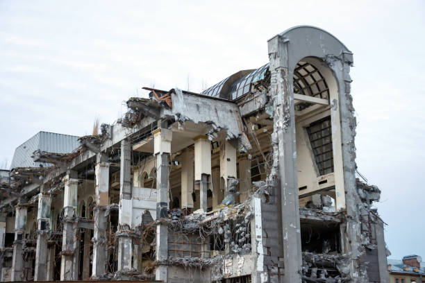 istock Destroyed building after demolition, man-made accident. The supporting columns, bearing structures are visible. Design construction errors. 1137596775