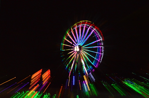 We often see the ferris wheel with only one color at a time and missed out the other nice colors, by taking this photo, we can see the full potential, the full colors of this ferris wheel.
