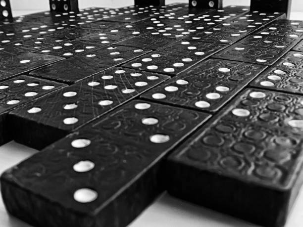 istock Dominoes in a mess on a white background in black and white technique (Picture No 11) 1137597651