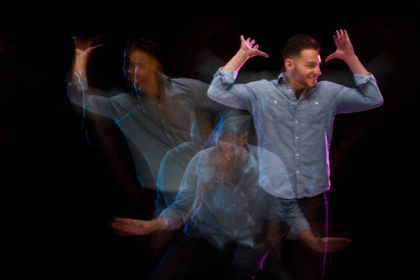 istock Handsome man in a blue shirt dancing 1137601057