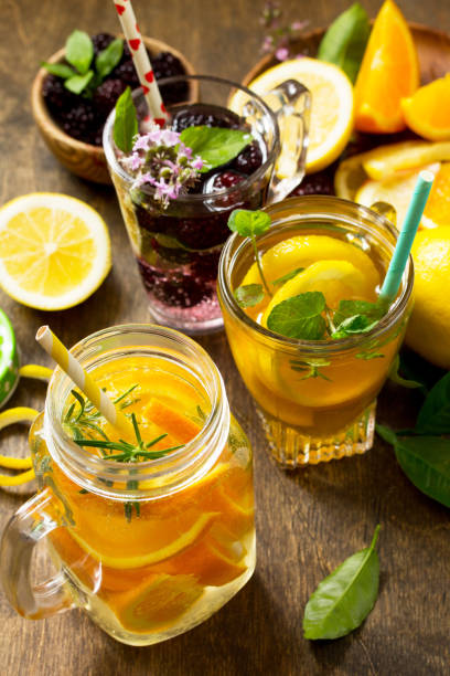 istock Summer drink set close-up. Refreshing summer berry Lemonade, lemon mint Tea and orange Lemonade with rosemary. 1137605618