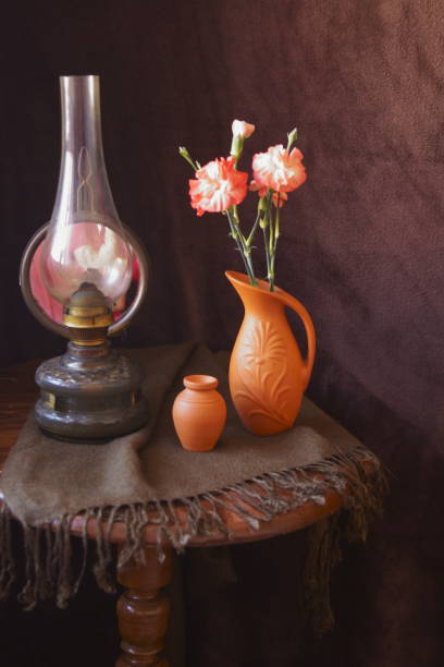 istock Romanian ceramics and gas lamp on a dark background 1137612651