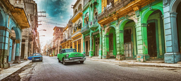 istock Vintage green oldtimer car driving through Old Havana Cuba 1137613135