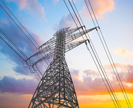 Electric Power Lines and Transmission Tower, Electric grid at sunset