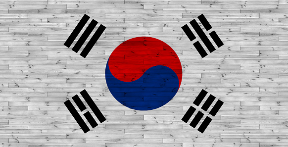 South Korean flag on wood texture
