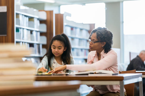 Female Tutoring Math 6,000+ Math Tutoring Stock Photos, Pictures & Royalty-Free Images - iStock