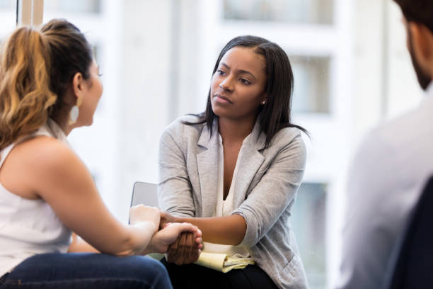 istock Compassionate counselor listens to female client 1137620247