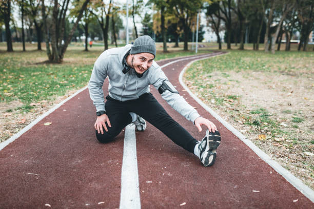 istock Young Athlete Stretching in the Park 1137621811