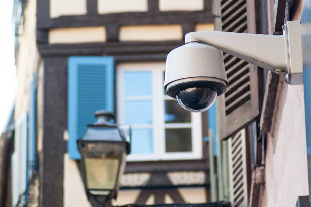 istock brown security cameras of security on urban background 1137623876