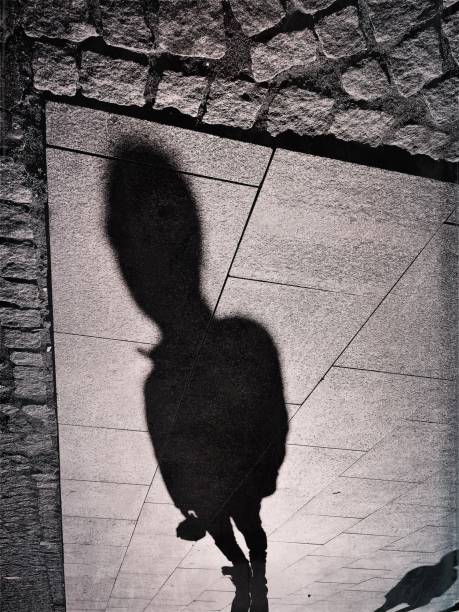 istock Monochrome view of a man shadow 1137623974