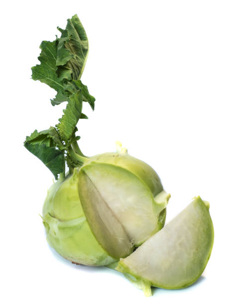 kohlrabi isolato su sfondo bianco - kohlrabi turnip kohlrabies cabbage foto e immagini stock