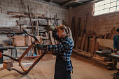istock Overworked female carpenter 1137626152
