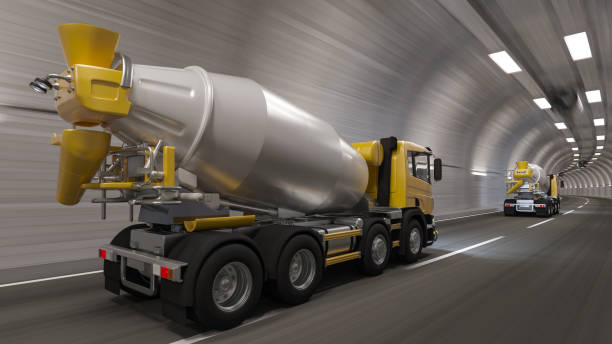 rear and side view of cement mixers inside a tunnel - truck motion road cement truck imagens e fotografias de stock