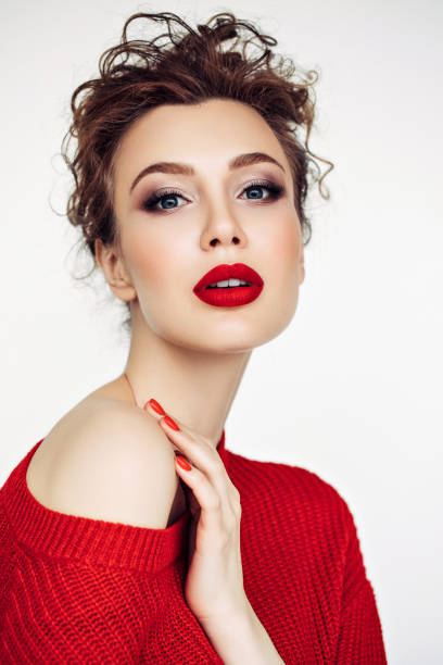istock Beautiful woman. Red sweater and red lipstick. 1137626437