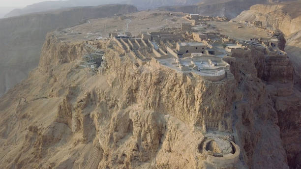 istock Flying up at ancient remains of masada 1137628433