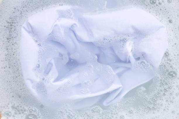 istock Soak a cloth before washing, white cloth 1137629175