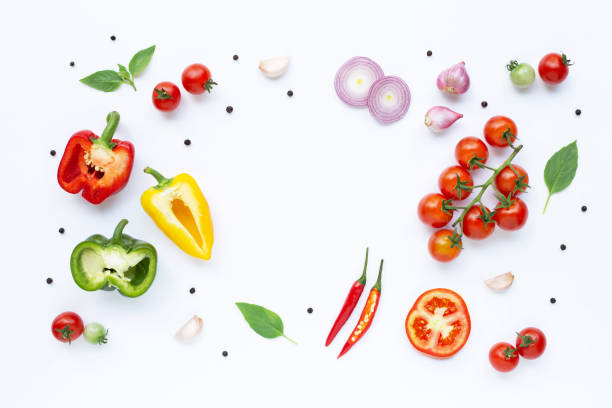 istock Various fresh vegetables and herbs on white background. Healthy eating concept 1137629216