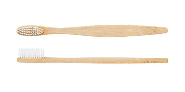 Photo of Bamboo toothbrush isolated on white background