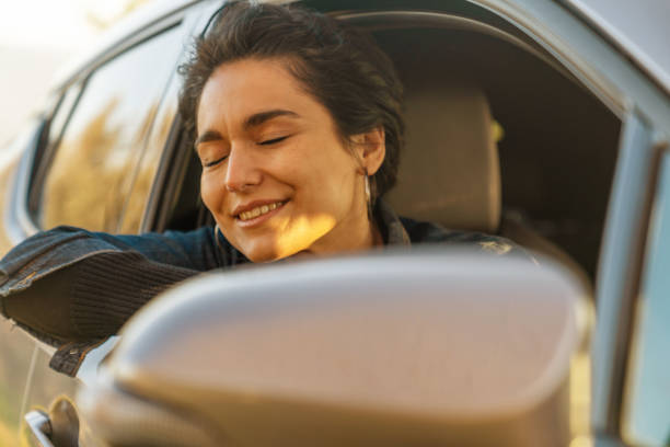 istock Young Woman on the Road Trip 1137635561