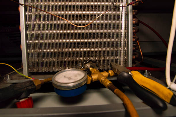 istock refrigerator repair - equipment and tools of a specialist in work 1137636433