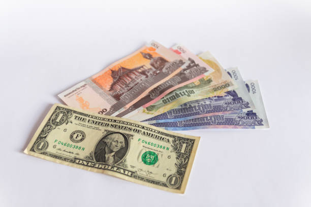 istock Cambodia riel and dollar banknotes cash isolated on white background 1137638996