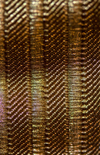 istock Close Up of Gold Coloured Stripe Fabric material 1137642694